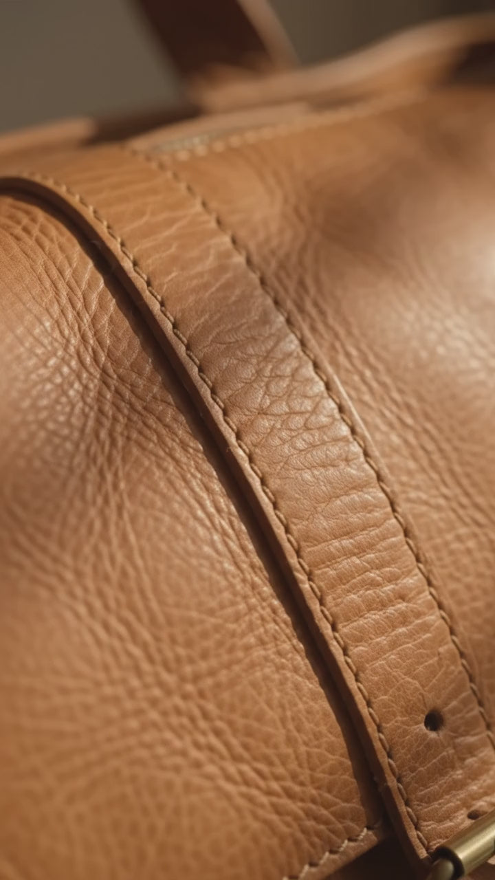 Sleek Leather Tote Bag with Metal Eyelet Details - Authentic Craftsmanship